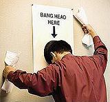 bang-head-here.jpg banging head on wall image by agtBobPhillips